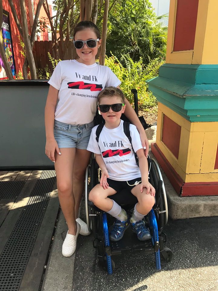 Ferrari Kids - girl and boy in a wheelchair
